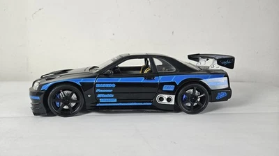 Nissan Skyline GTR SSTuner Muscle Machines 1/18 Diecast - Image 1 of 4