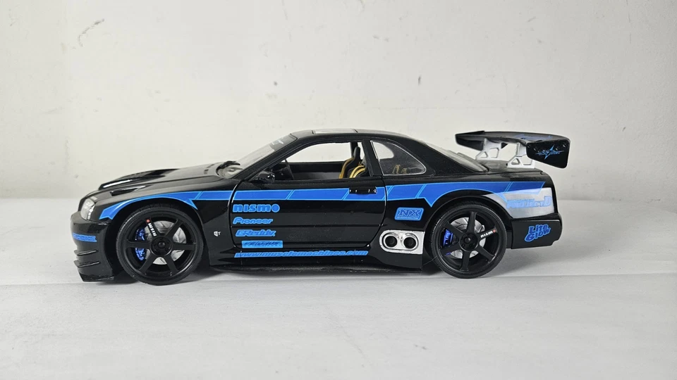 Nissan Skyline GTR SSTuner Muscle Machines 1/18 Diecast - Image 1 of 4