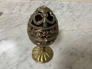 Musical Metal Egg Shaped Music Box with Rotating Cardinal Inside - Picture 1 of 5