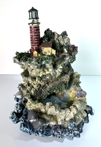 Faro de mesa fuente de delfines pueblo casa de campo batería de resina 4 AA funcionando - Imagen 1 de 15