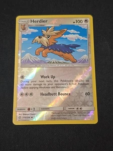Herdier 175/236 Sole e Luna Eclissi Cosmica Reverse Holo 2019 Pokemon TCG NM - Foto 1 di 2