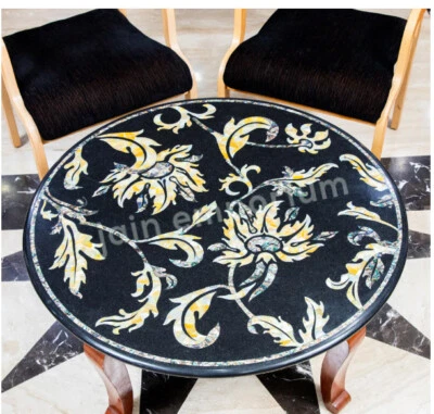 Mesa de comedor redonda amarilla madreperla mármol negro 30" incrustación Foto 1 de 3