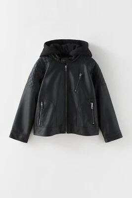 CHAQUETA ZARA NIÑOS NIÑO CAPUCHA DESMONTABLE IMITACIÓN CUERO NEGRA 5854/773 TALLA 7 Foto 1 de 3