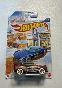 HOT WHEELS ROJO 2021 #3 NAVIDAD NAVIDAD FORD ESCORT MUÑECO DE NIEVE TALLER DE RENOS - Imagen 1 de 2