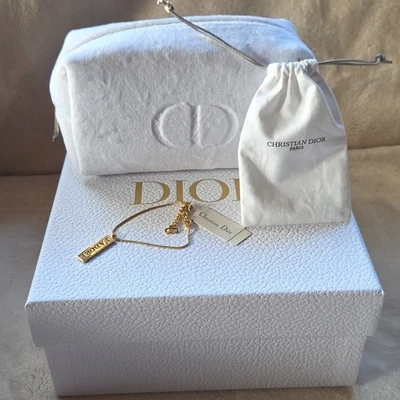 Pulsera Dior Gold J'adore Charm, bolsa para el polvo, bolsa y caja Foto 1 de 4