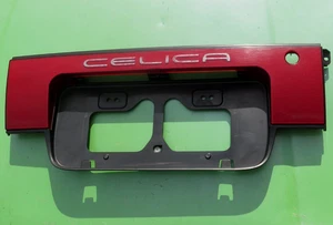 TOYOTA CELICA 90-91 TRUNK LID LICENSE PLATE SURROUND 75082-20200 OEM ALL TRAC - Bild 1 von 14