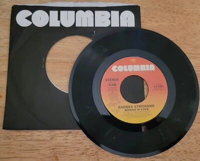 Barbara Streisand "Woman in Love"/"Run Wild" 45 RPM Vinyl Record 7" Single (EX) - Image 1 of 2