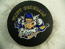 UHL CoHL Flint Generals Die Cut Travelodge Ad Reverse Hockey Puck Collect Pucks