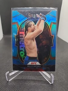 Brian Ortega 2023 Panini Select UFC Concourse Light Blue Prizm SP #d/249 - Picture 1 of 3