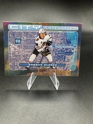 Connor Bedard 2024-25 Upper Deck Series 1 City Satellites #CS-11 Blackhawks - Image 1 of 2