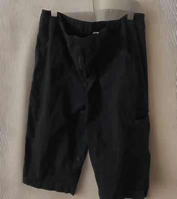 Ciervo Capris blanco negro 12 puños con lengüeta enrollable bolsillos cortados bolsillo bordado cremallera Foto 1 de 4