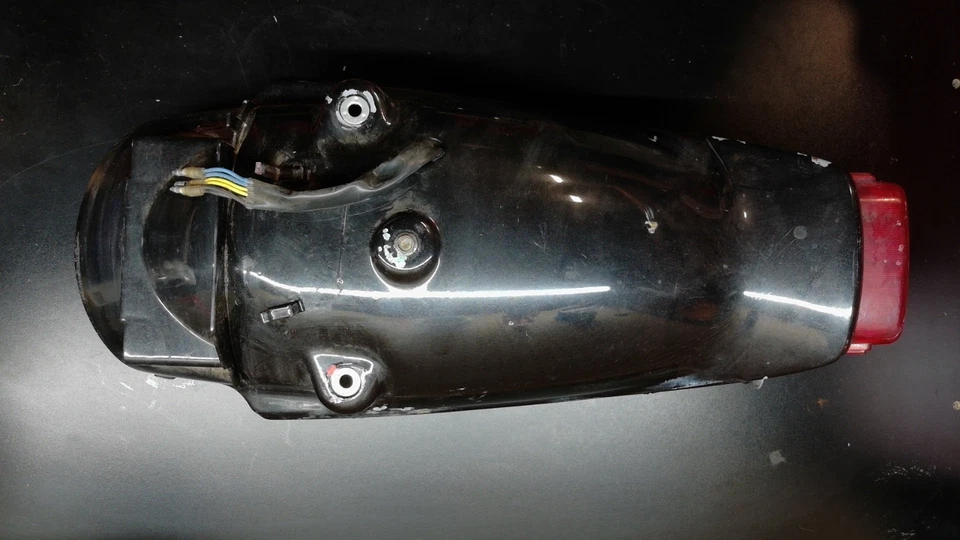 85-07 Yamaha VMAX 1200 VMX12 Rear Wheel Fender Brake Light Mount - Image 1 of 4