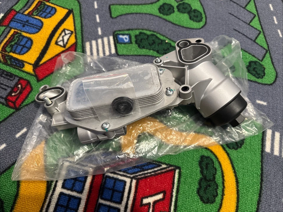 Oil Filter Housing And Oil Cooler 2008 Saturn Astra Aveo Brand New Old Stock - Image 1 of 1