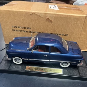 Mira Solido 1949 Ford Deluxe Cabrio Maßstab 1:18 Diecast Modellauto blau - Bild 1 von 11