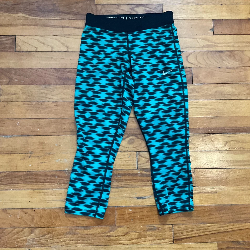 Medias recortadas para correr Nike XS Dri-Fit para mujer entrepierna 19,5" bolsillo con cremallera Foto 1 de 4