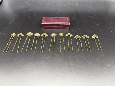 Antiguo juego de horquillas pintadas a mano en tono dorado con caja - Lote de 11 Foto 1 de 4