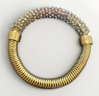 Brazalete Brazalete Único Medio y Medio Kenneth Cole Estrás Tono Dorado Serpentina Foto 1 de 4