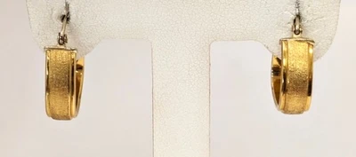 Pendientes de oro de 18 quilates Foto 1 de 4