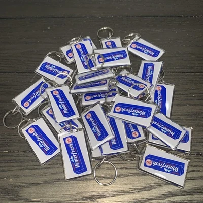 25 винтажных рекламных брелоков для ключей Wrigley's Winterfresh 25 центов жевательная резинка 1994 новые из старых запасов - Изображение 1 из 3