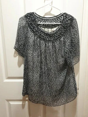 Top manga corta COLDWATER CREEK blanco y negro con estampado de animales forrado transparente talla L 14 Foto 1 de 4