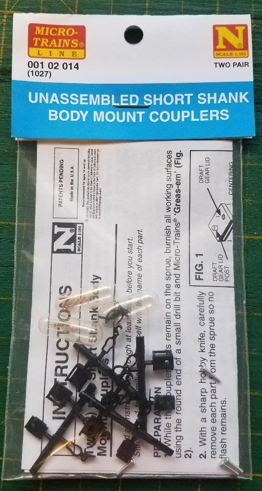 N Micro Trains 001 02 014 (1027) Unassembled Short Shank B Mount Couplers  - Image 1 of 1