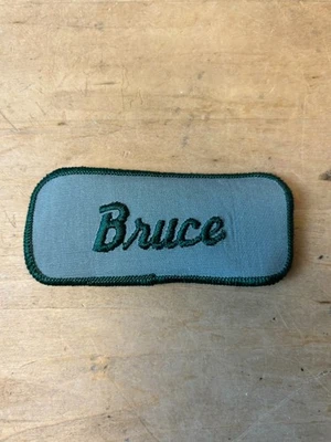 Vtg 70s BRUCE Sew On Embroidered Clothing Jacket Uniform Name Patch GREEN - Image 1 of 3