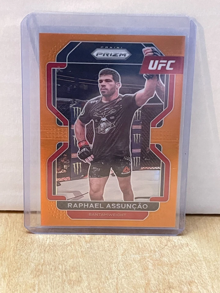 Raphael Assuncao 2022 Panini Prizm UFC Orange Refractor No.102 /99 - Image 1 of 2
