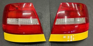 1999-2002 Audi B5 S4 A4 Sedan Tail Lights With Imola Yellow Trim Pieces OEM - Picture 1 of 8