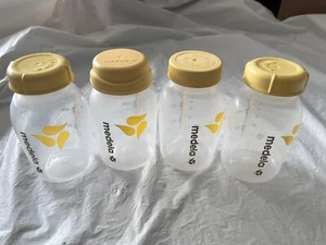 MEDELA 5OZ PLASTIC BOTTLES WITH CAPS, PREOWNED, EUC, LOT OF 4 - Picture 1 of 4