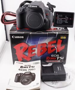 Shutter only 754 (1%) Canon EOS Rebel T5i 700D 18MP DSLR Camera body with extra