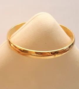 Vintage Monet Armreif Armband poliert goldfarben rund Slip On signiert Klassiker - Bild 1 von 3