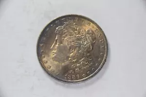 Dólar de plata Morgan 1886, tonificado, AU - Imagen 1 de 2