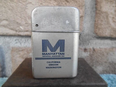 VINTAGE STORM MASTER DUAL AD CIGARETTE LIGHTER. MANHATTAN GENERAL AGENCIES. - Image 1 of 4