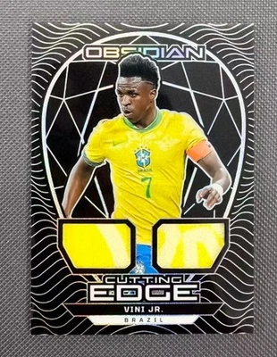 Vini Jr. 2024-25 Panini Obsidian Cutting Edge Dual Patch /125 #CE-VJR - Image 1 of 2