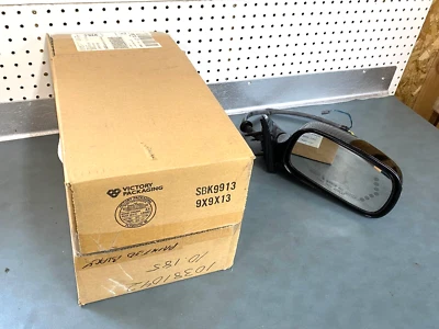 GM OEM NOS 10381042 Passenger Mirror Painted Black 2003-2005 Cadillac Deville - Image 1 of 4