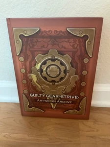 Guilty Gear Strive 25th Anniversary Collector Edition HC Artbook, US Inglese NUOVO - Foto 1 di 5