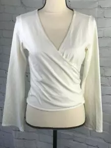 Top envolvente de algodón elástico EILEEN FISHER cuello en V manga larga corbata marfil EE. UU. pequeña. - Imagen 1 de 12