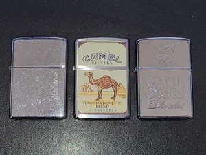 LOT DE 3 ZIPPO CIGARETTES TABAC CAMEL MARLBORO GAULOISES BLONDES BRIQUETS - Picture 1 of 22