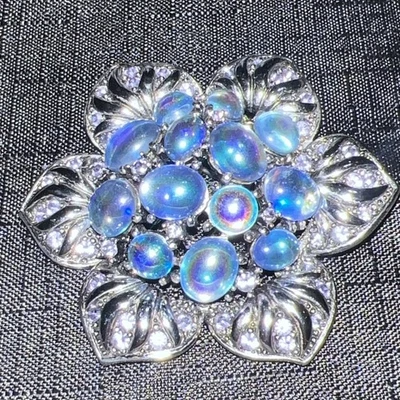 Broche prendedor vintage azul ab jalea azul tono plata firmado por Joan Rivers Foto 1 de 4