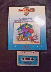 LIBRO/CINTA DE PELUCHE RUXPIN EL VAGÓN DE LA MEDICINA FUNCIONA MUNDOS DE MARAVILLA - Imagen 1 de 4