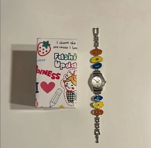 Reloj Twinkle Artsy Azul Amarillo Naranja Colorido Brazalete con Extensor Tono Plateado - Imagen 1 de 5