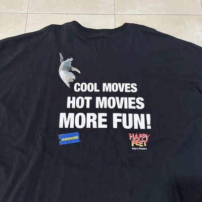 Camisa De Colección Happy Feet Película Blockbuster Promo Camiseta Pingüino Dibujos Animados Película 2XL Foto 1 de 4