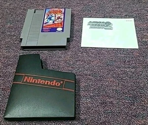 Mega Man II 2 (Nintendo) NES (funziona bene) autentico (come nuovo) con manuale e cover antipolvere - Foto 1 di 16