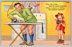 1938 MAN IRONING in BOXER SHORTS SOCK GARTERS GIRL CAMERA VINTAGE LINEN POSTCARD - Picture 1 of 2