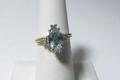 BLUE NATURAL AQUAMARINE & DIAMONDS SET IN 10K WHITE GOLD RING - Image 1 of 4