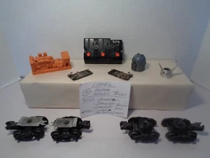 LOTE DE PIEZAS DE DISTRIBUIDOR DE POSGUERRA LIONEL. CAMIONES, 3520,456C, CLIPS DE PISTA CTC. - Imagen 1 de 12