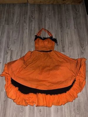 DISFRAZ HALLOWEEN ESCENARIO VINTAGE AÑOS 70 RED NARANJA AÑOS 70 TALÓN Foto 1 de 4