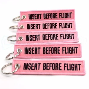 INSERT BEFORE FLIGHT QTY= 5 PCS PINK/black KEYCHAINS RING TAGS CABIN CREW - Picture 1 of 3
