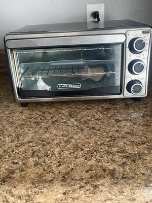 BLACK+DECKER TO1303SB: 4-Slice Toaster Oven, Stainless Steel - Silver - Image 1 of 4