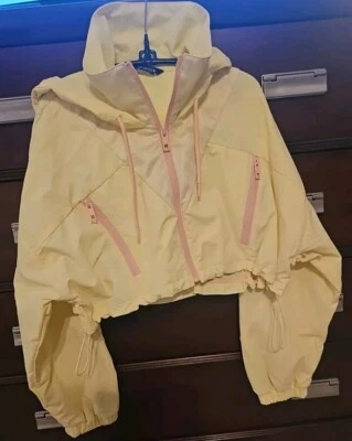 Chaqueta cortavientos Zara para mujer M (GRANDE) amarilla melocotón cremallera capucha recortada retro Foto 1 de 4
